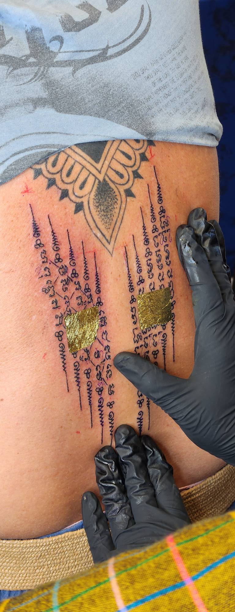 Pong Chaiya Sak Yant munkája a Pinker Tattoo galériából